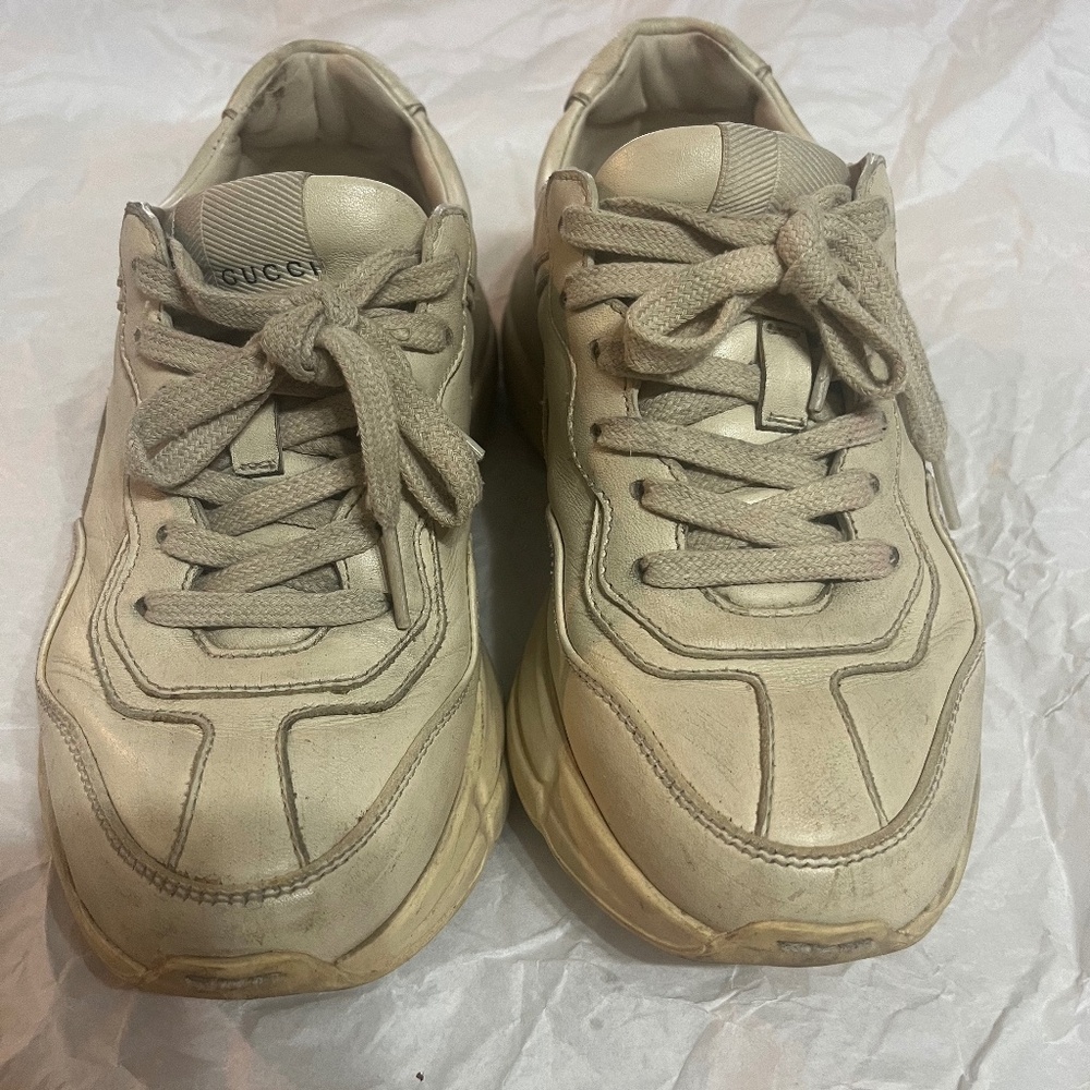 Gucci women Rhyton sneakers in distressed ivory